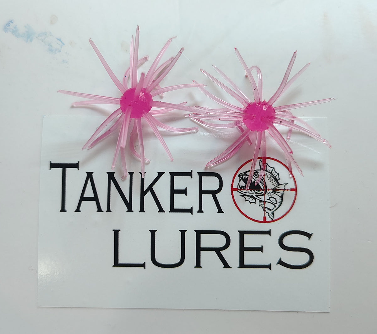 Pink 1.5" urchin-style crappie and panfish lure 2 pack.