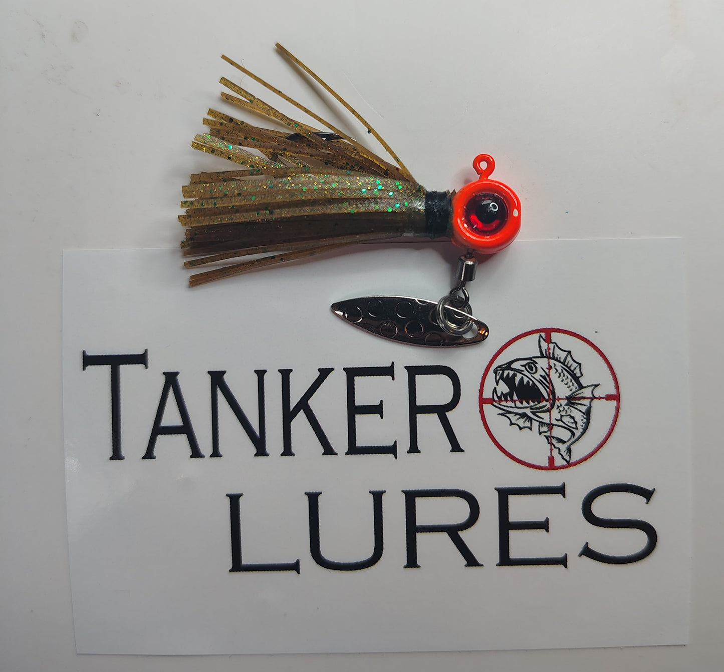 Green Pumpkin with green flake hand tied underspin jig.